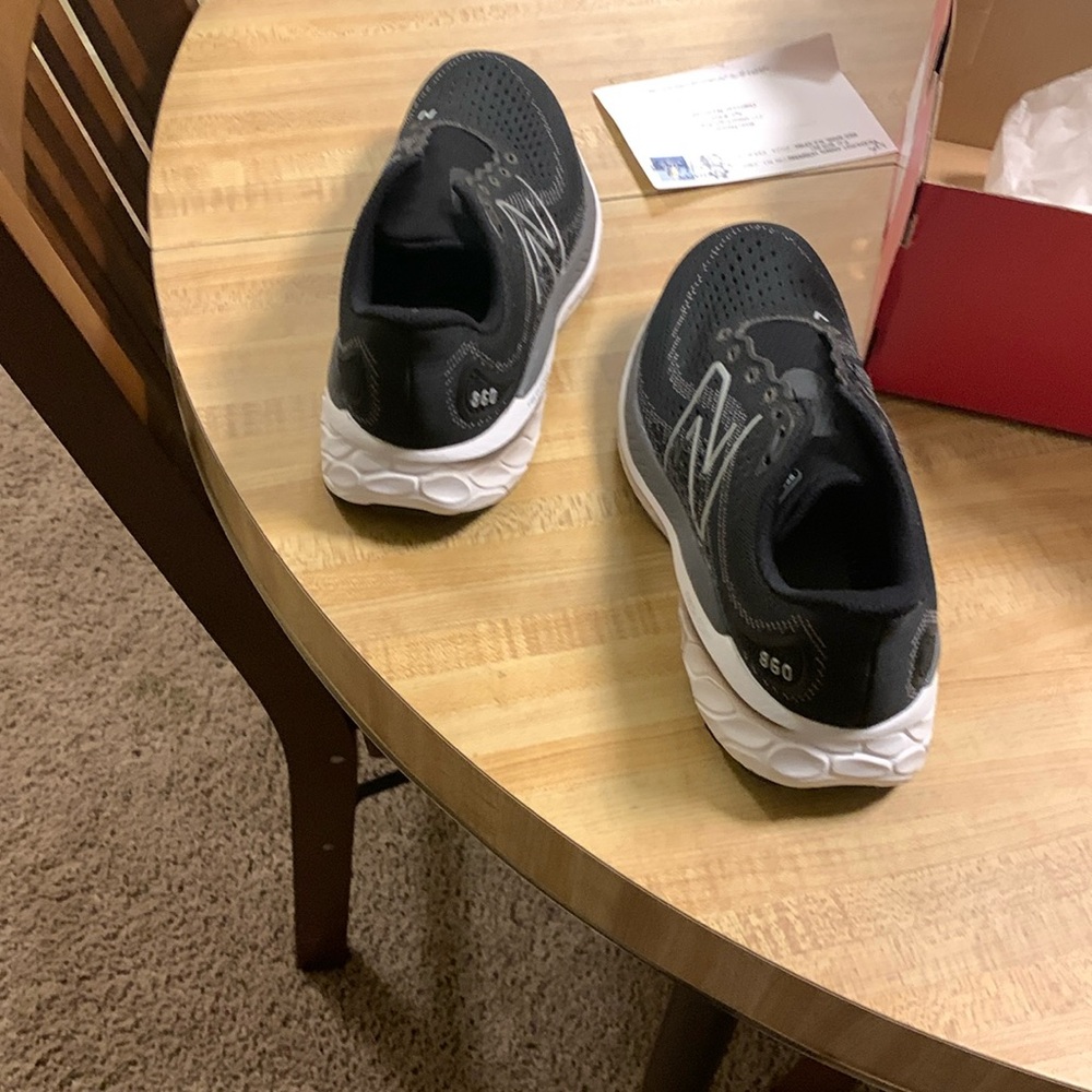 New balance shoes  size  7 wide D larger they black and whi